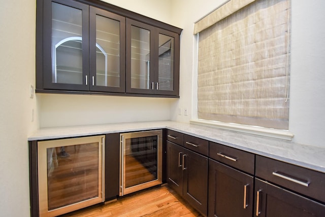 4220 Law St, Houston, TX 77005 - indoor dry bar featuring beverage cooler and light wood finished floors