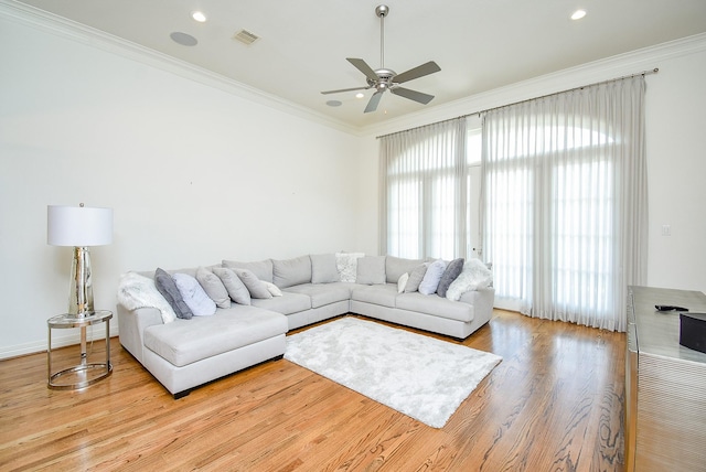 4220 Law St, Houston, TX 77005 - living area with wood finished floors, ornamental molding, a ceiling fan, recessed lighting, and baseboards