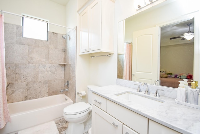 4220 Law St, Houston, TX 77005 - ensuite bathroom featuring vanity, shower / bath combo with shower curtain, toilet, and ceiling fan