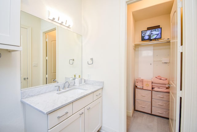 4220 Law St, Houston, TX 77005 - bathroom featuring vanity and baseboards