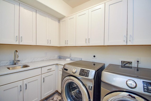 4220 Law St, Houston, TX 77005 - washroom with washing machine and dryer and cabinet space