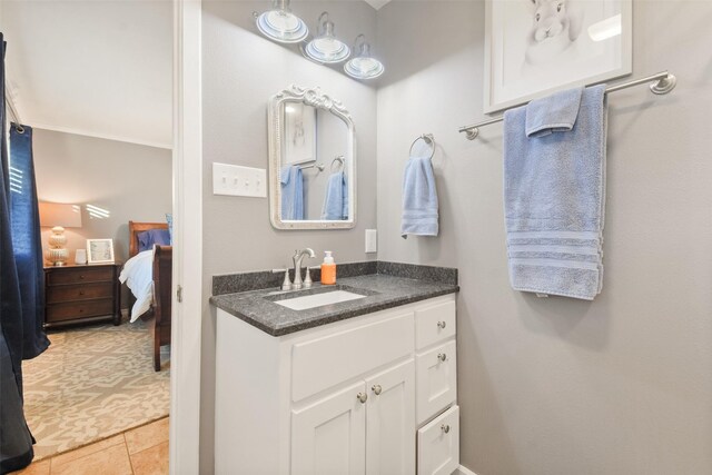 4620 Springfield Ln, Brenham, TX 77833 - ensuite bathroom with vanity and tile patterned flooring