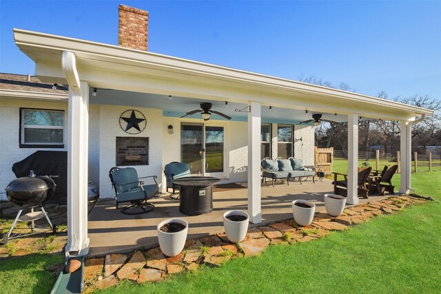 4620 Springfield Ln, Brenham, TX 77833 - view of patio / terrace featuring ceiling fan and an outdoor living space with a fire pit