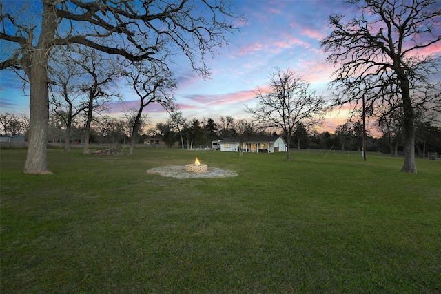 4620 Springfield Ln, Brenham, TX 77833 - view of grassy yard featuring a fire pit