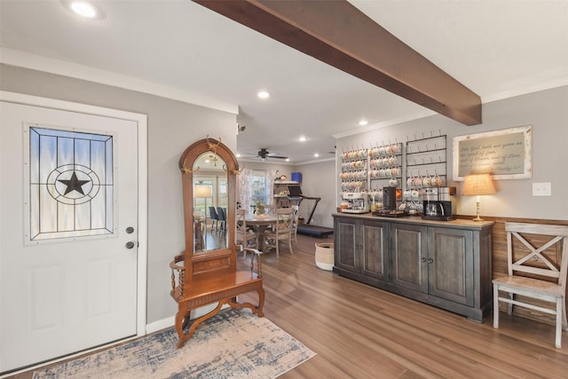 4620 Springfield Ln, Brenham, TX 77833 - foyer featuring ornamental molding, wood finished floors, a bar, recessed lighting, and ceiling fan