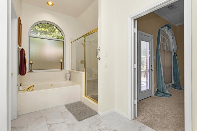 529 Stephen F Austin Dr, Conroe, TX 77302 - full bath featuring a bath, a shower stall, marble look tile flooring, and baseboards
