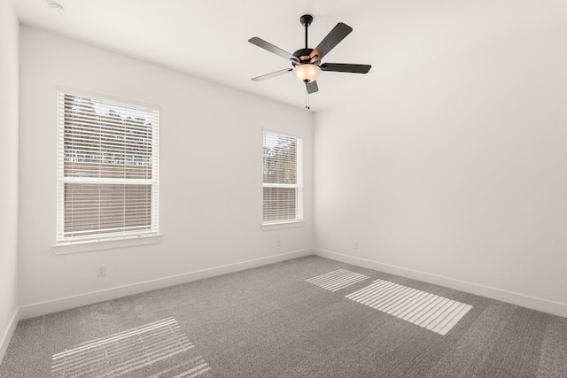 17051 Lilac Paxton Ln, Hockley, TX 77447 - empty room with carpet flooring, baseboards, and ceiling fan