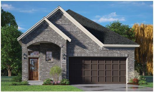 17051 Lilac Paxton Ln, Hockley, TX 77447 - view of front of property featuring brick siding, a garage, and concrete driveway