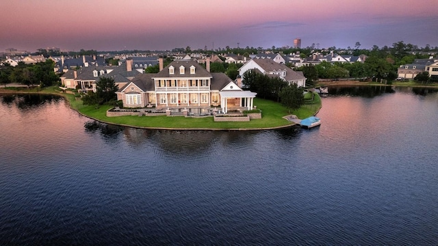 31 Southern Crescent Ct, The Woodlands, TX 77380 - aerial perspective of suburban area with a nearby body of water