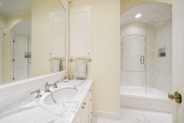 31 Southern Crescent Ct, The Woodlands, TX 77380 - full bathroom with vanity, baseboards, combined bath / shower with glass door, and crown molding