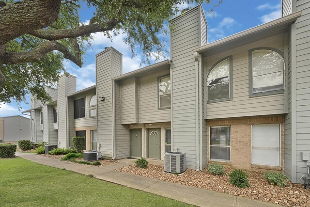 260 El Dorado Blvd Unit 205, Houston, TX 77598 - view of front of home with central AC and a chimney