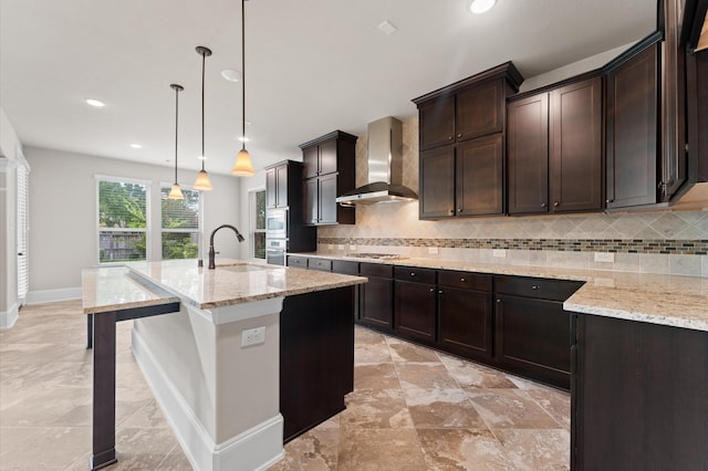 10115 Cypress Path, Missouri City, TX 77459 - kitchen with wall chimney exhaust hood, baseboards, tasteful backsplash, a sink, and recessed lighting