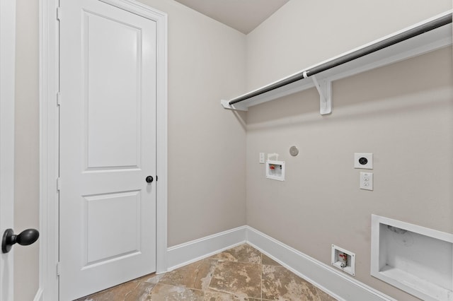 10115 Cypress Path, Missouri City, TX 77459 - laundry room featuring electric dryer hookup, washer hookup, baseboards, gas dryer hookup, and stone finish floors