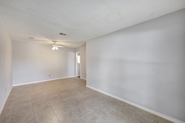 3826 Brier Gardens Dr, Houston, TX 77082 - unfurnished room featuring a ceiling fan, a textured ceiling, light tile patterned floors, and baseboards