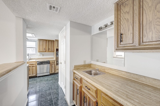 3826 Brier Gardens Dr, Houston, TX 77082 - kitchen with dishwasher, a sink, a textured ceiling, light countertops, and dark tile patterned floors