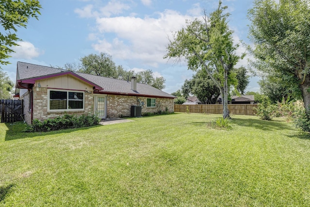 3826 Brier Gardens Dr, Houston, TX 77082 - view of yard featuring french doors and central air condition unit