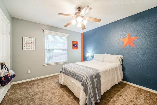 2957 Water Willow Ln, Pearland, TX 77581 - bedroom with carpet floors, a textured wall, and a ceiling fan