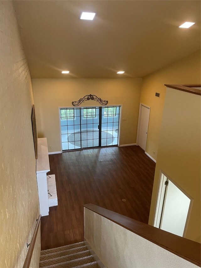 325 E Main St, Brenham, TX 77833 - stairs with wood finished floors and recessed lighting