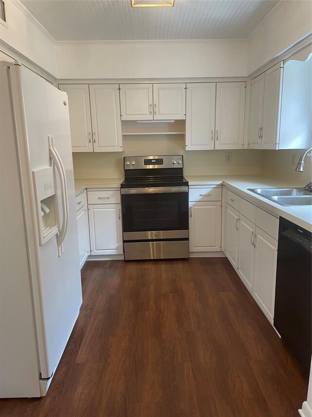 325 E Main St, Brenham, TX 77833 - kitchen with white fridge with ice dispenser, stainless steel electric stove, black dishwasher, light countertops, and white cabinets