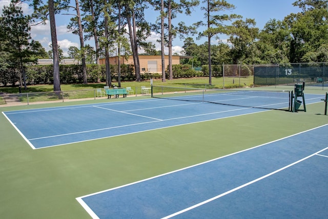 12100 Melville Dr Unit 606, Montgomery, TX 77356 - view of tennis court featuring community basketball court