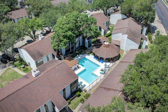 12100 Melville Dr Unit 606, Montgomery, TX 77356 - aerial perspective of suburban area featuring a pool