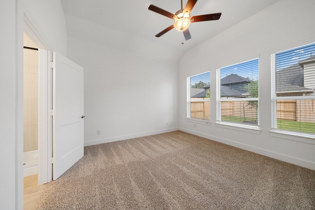 17055 Lilac Paxton Ln, Hockley, TX 77447 - spare room with light carpet, a ceiling fan, baseboards, and lofted ceiling