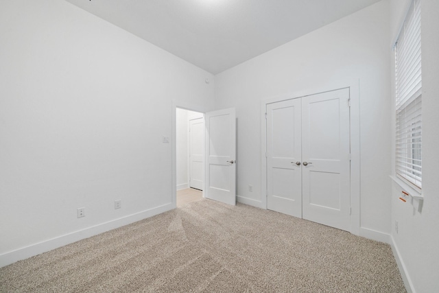 17055 Lilac Paxton Ln, Hockley, TX 77447 - unfurnished bedroom with carpet flooring, baseboards, and a closet