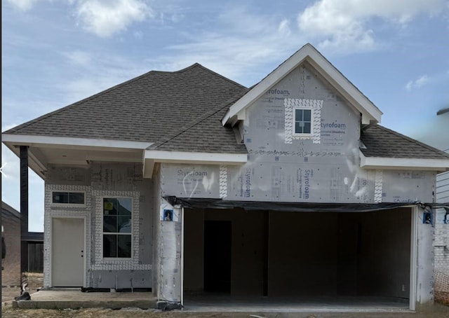 17055 Lilac Paxton Ln, Hockley, TX 77447 - back of property with roof with shingles and an attached garage