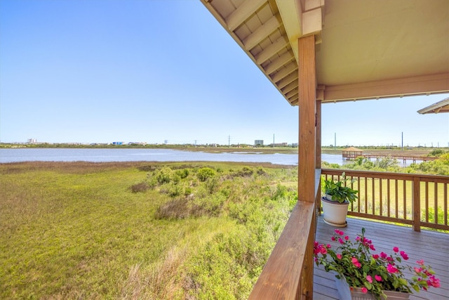 2811 Izamal Ct, Galveston, TX 77554 - wooden terrace featuring a water view