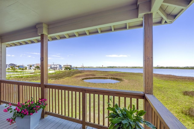 2811 Izamal Ct, Galveston, TX 77554 - wooden deck featuring a water view