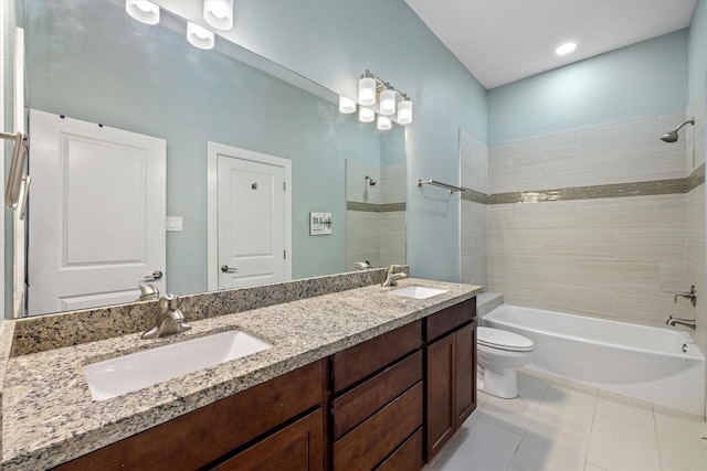 2811 Izamal Ct, Galveston, TX 77554 - bathroom featuring toilet, double vanity, shower / tub combination, and tile patterned flooring