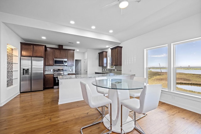 2811 Izamal Ct, Galveston, TX 77554 - dining area featuring light wood finished floors, recessed lighting, and ceiling fan