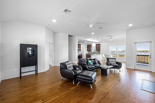 2811 Izamal Ct, Galveston, TX 77554 - living area with ceiling fan, wood finished floors, recessed lighting, baseboards, and lofted ceiling