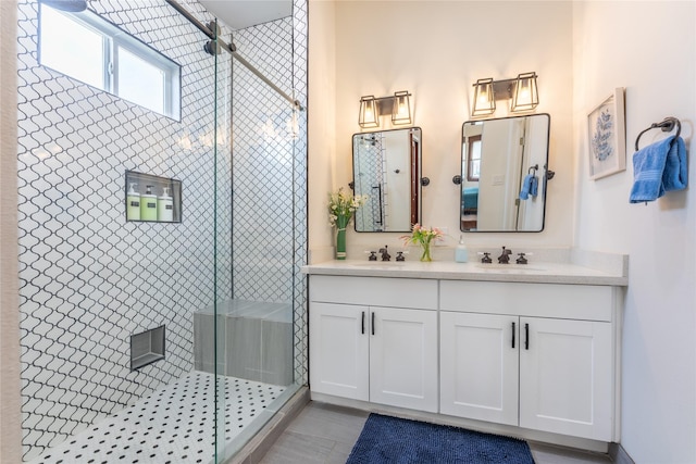 1828 Ursuline St, Galveston, TX 77550 - bathroom with double vanity and a stall shower