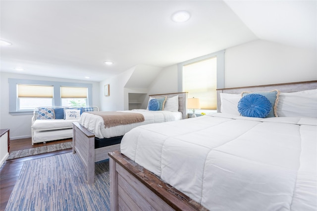 1828 Ursuline St, Galveston, TX 77550 - bedroom featuring wood finished floors, vaulted ceiling, baseboards, and recessed lighting