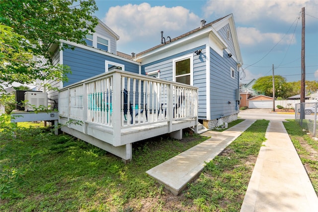1828 Ursuline St, Galveston, TX 77550 - back of house featuring a wooden deck