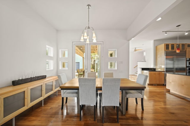 3810 Bellefontaine St, Houston, TX 77025 - dining space featuring hardwood / wood-style flooring and a chandelier