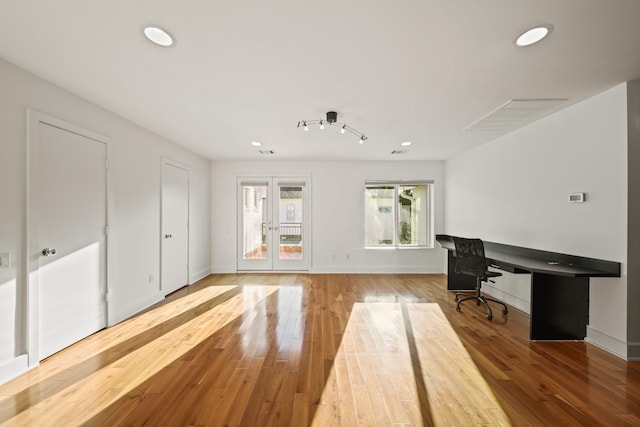 3810 Bellefontaine St, Houston, TX 77025 - office area featuring wood finished floors and recessed lighting
