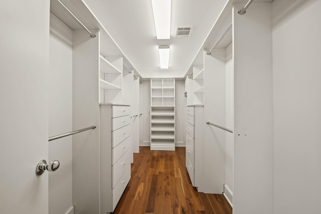 3810 Bellefontaine St, Houston, TX 77025 - spacious closet with dark wood-style floors