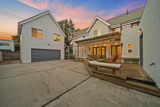 3810 Bellefontaine St, Houston, TX 77025 - view of front of home with a garage, concrete driveway, and stucco siding