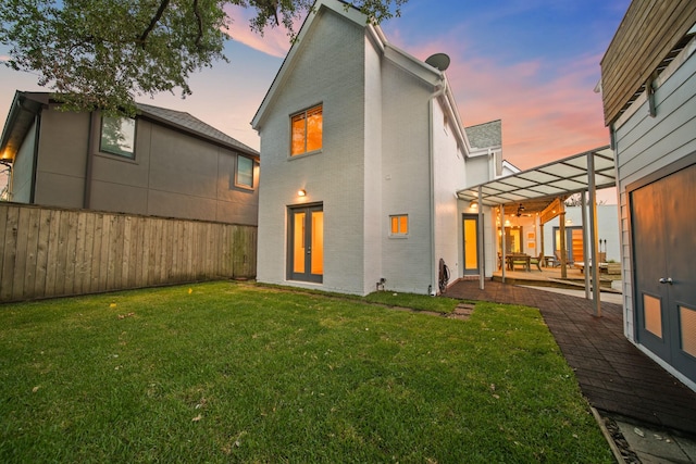3810 Bellefontaine St, Houston, TX 77025 - rear view of house featuring a patio and brick siding