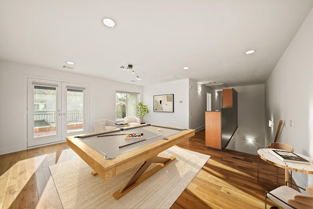 3810 Bellefontaine St, Houston, TX 77025 - recreation room featuring french doors, billiards, wood finished floors, and recessed lighting