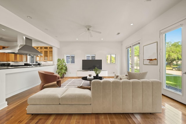 3810 Bellefontaine St, Houston, TX 77025 - living area with recessed lighting, ceiling fan, and wood-type flooring