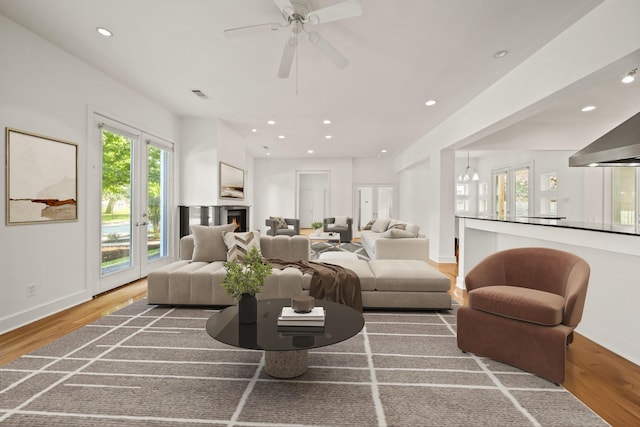 3810 Bellefontaine St, Houston, TX 77025 - living area with wood finished floors, recessed lighting, and ceiling fan