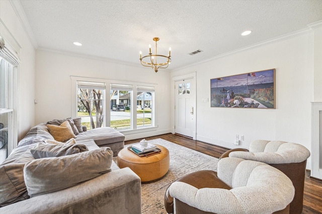 2229 Singleton St, Houston, TX 77008 - living area featuring a chandelier, crown molding, dark wood-style floors, recessed lighting, and baseboards