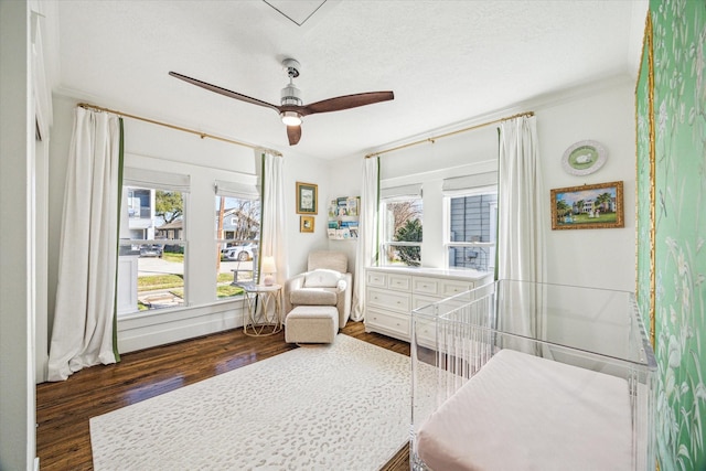 2229 Singleton St, Houston, TX 77008 - bedroom featuring wood finished floors, crown molding, and a ceiling fan