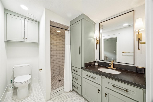 2229 Singleton St, Houston, TX 77008 - bathroom with vanity, toilet, tiled shower, and tile patterned flooring