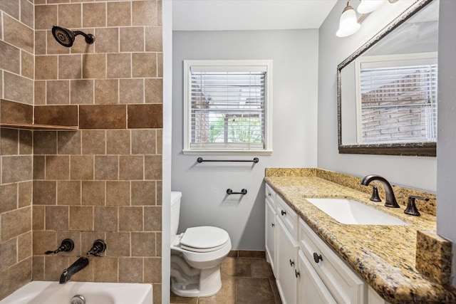 5227 Willowbend Blvd, Houston, TX 77096 - full bathroom featuring vanity, toilet,  shower combination, and baseboards