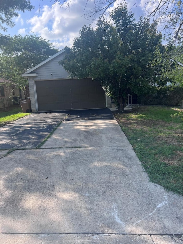 7340 Muffin Dr, Austin, TX 78724 - view of front facade featuring brick siding and driveway
