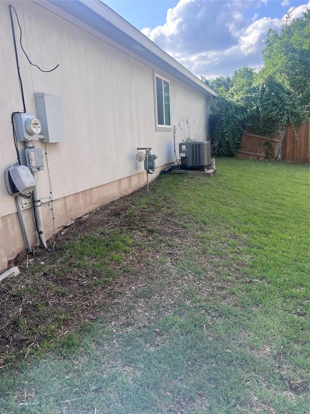7340 Muffin Dr, Austin, TX 78724 - view of yard featuring central AC unit
